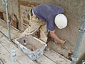 Greg using lime mortar